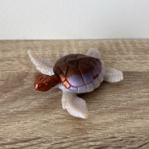 Petite tortue blanche et cuivre
