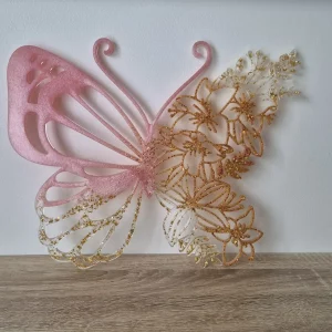 Papillon rose et doré