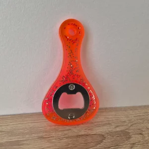 Décapsuleur rose/orange à paillettes