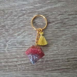 Porte-clés diamant rose et gris avec pompon jaune
