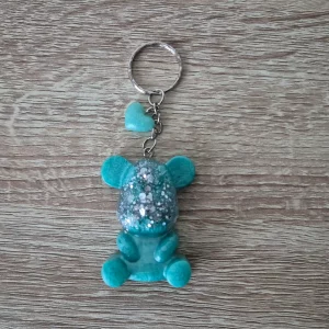 Porte-clés ours bleu à paillettes