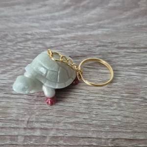 Porte-clés tortue blanche et rouge